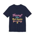 Thriving? No, But Thanks for Asking Tee | mental health humor, retro wavy text